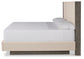 Anibecca Queen Upholstered Panel Bed with Mirrored Dresser